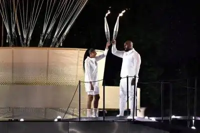 Marie-Jose Perec y Teddy Riner en la ceremonia inaugural. / AFP