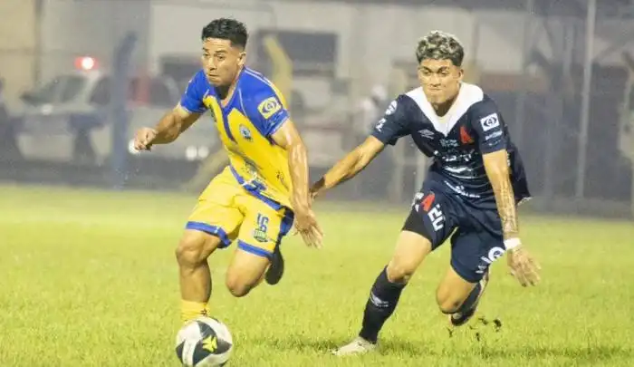 Tereso Benítez y Alejandro Henríquez en acción. 